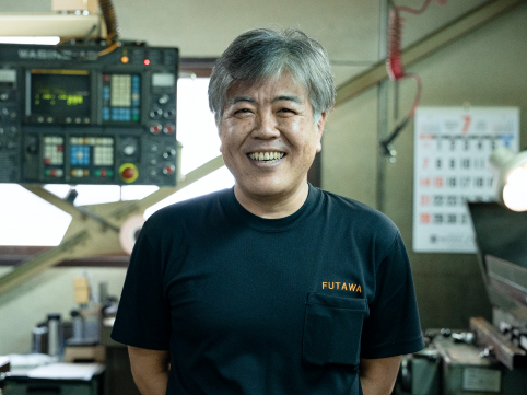 フタワ精密製作所の社長の笑顔